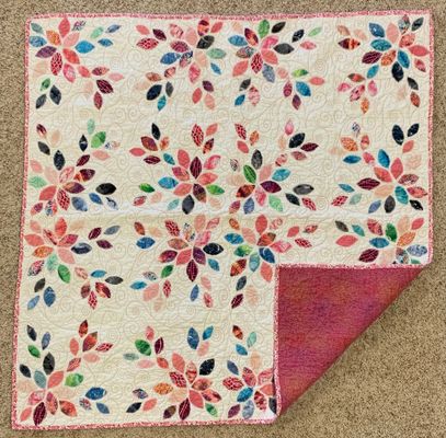 Flower petal lap quilt